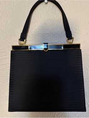 Classic Black Structured Top-Handle Bag with Gold Trim